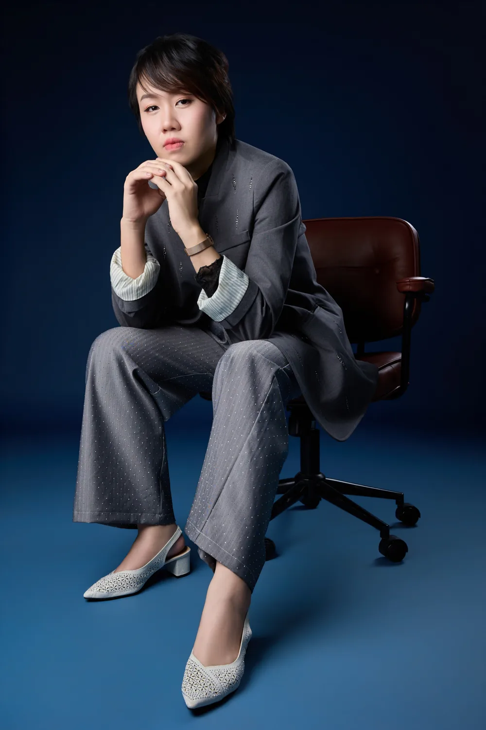 Seated professional portrait of Vivien Lim